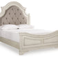 Realyn Queen Upholstered Panel Bed